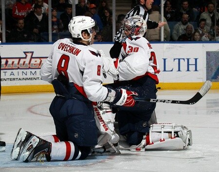 UNIONDALE, NY - FEBRUARY 26: Alex Ovechkin #8 and Michal Neuvirth #30 of the Washington Capitals pause during a play stoppage in the second period in their game against the New York Islanders at the Nassau Coliseum on February 26, 2011 in Uniondale, New York.  <br /><br /><span class="help">(Photo by Bruce Bennett/Getty Images)</span>
