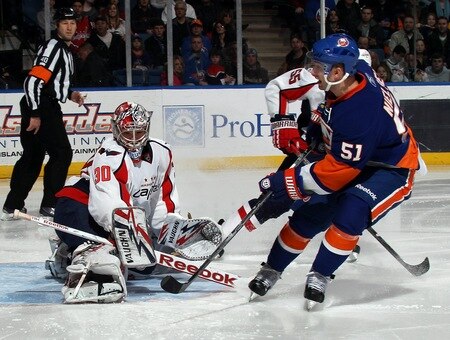 UNIONDALE, NY - FEBRUARY 26: Michal Neuvirth #30 of the Washington Capitals makes the save against Frans Nielsen #51 of the New York Islanders  at the Nassau Coliseum on February 26, 2011 in Uniondale, New York.  <br /><br /><span class="help">(Photo by Bruce Bennett/Getty Images)</span>