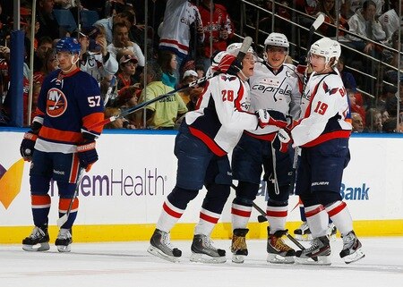 UNIONDALE, NY - FEBRUARY 26:  Alexander Semin #28 of the Washington Capitals celebrates his third period goal with teammates Alex Ovechkin #8 and Nicklas Backstrom #19 as Blake Comeau #57 of the New York Islanders skates away on February 26, 2011 at Nassau Coliseum in Uniondale, New York.  <br /><br /><span class="help">(Photo by Mike Stobe/NHLI via Getty Images)</span>
