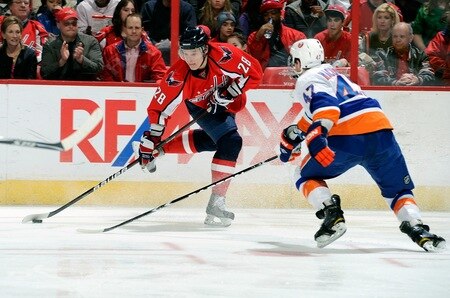 WASHINGTON, DC - MARCH 01:  Alexander Semin #28 of the Washington Capitals shoots the puck past Andrew MacDonald #47 of the New York Islanders at the Verizon Center on March 1, 2011 in Washington, DC.  <br /><br /><span class="help">(Photo by Greg Fiume/Getty Images)</span>