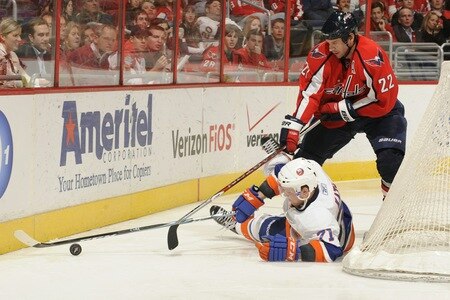 WASHINGTON, DC - MARCH 1:  Mike Knuble #22 of the Washington Capitals goes after a loose put against Mark Karic #71 of the New York Islanders during a NHL hockey game on March 1, 2011 at the Verizon Center in Washington, DC.  <br /><br /><span class="help">(Photo by Mitchell Layton/NHLI via Getty Images)</span>