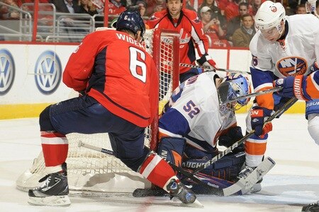 WASHINGTON, DC - MARCH 1:  Dennis Wideman #6 of the Washington Capitals takes a shot on Nathan Lawson #52 of the New York islanders during a NHL hockey game on March 1, 2011 at the Verizon Center in Washington, DC.  <br /><br /><span class="help">(Photo by Mitchell Layton/NHLI via Getty Images)</span>