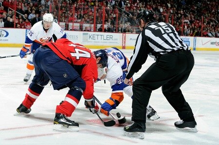 WASHINGTON, DC - MARCH 01:  Jason Arnott #44 of the Washington Capitals takes a face off against Zenon Konopka #28 of the New York Islanders at the Verizon Center on March 1, 2011 in Washington, DC.  <br /><br /><span class="help">(Photo by Greg Fiume/Getty Images)</span>
