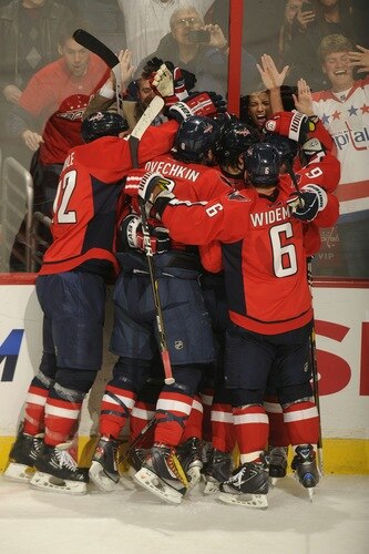 WASHINGTON, DC - MARCH 1:  The Washington Capitals celebrate their first goal during the third period of a NHL hockey game against the New York Islanders on March 1, 2011 at the Verizon Center in Washington, DC.  <br /><br /><span class="help">(Photo by Mitchell Layton/NHLI via Getty Images)</span>