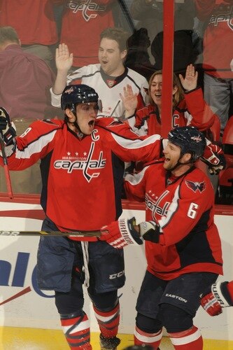 WASHINGTON, DC - MARCH 1:  Alex Ovechkin #8 and Marco Sturm #18 of the Washington Capitals celebrate game wining goal during overtime of a NHL hockey game against the New York Islanders on March 1, 2011 at the Verizon Center in Washington, DC.  The Capitals won 2-1.  <br /><br /><span class="help">(Photo by Mitchell Layton/NHLI via Getty Images)</span>