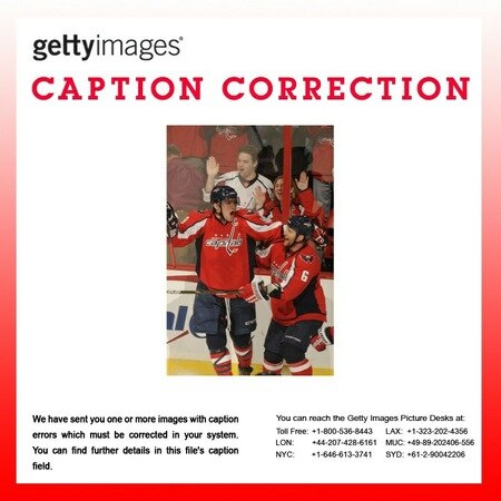 Attention Editors: This is to correct caption information for the following image:

GYI0063765519.jpg

Dennis Wideman was incorrectly identified as Marco Sturm. 

We apologize for any inconvenience, caption should read as follows:

WASHINGTON, DC - MARCH 1:  Alex Ovechkin #8 and Dennis Wideman #6 of the Washington Capitals celebrate game winning goal during overtime of a NHL hockey game against the New York Islanders on March 1, 2011 at the Verizon Center in Washington, DC.  The Capitals won 2-1.  <br /><br /><span class="help">(Photo by Mitchell Layton/NHLI via Getty Images)</span>