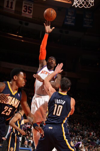 NEW YORK, NY - MARCH 13:  Amar'e Stoudemire #1 of the New York Knicks shoots over Jeff Foster #10 of the Indiana Pacers during a game on March 13, 2011 at Madison Square Garden in New York City.  <br /><br /><span class="help">(Photo by Nathaniel S. Butler/NBAE via Getty Images)</span>