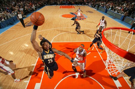 NEW YORK, NY - MARCH 13: Brandon Rush #25 of the Indiana Pacers dunks over Carmelo Anthony #7 of the New York Knicks on March 13, 2011 at Madison Square Garden in New York City.  <br /><br /><span class="help">(Photo by Nathaniel S. Butler/NBAE via Getty Images)</span>