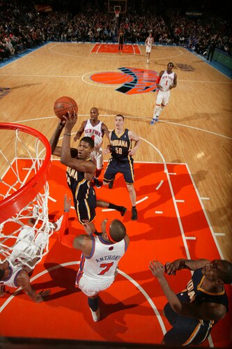 NEW YORK, NY - MARCH 13: Paul George #24 of the Indiana Pacers shoots over Carmelo Anthony #7 of the New York Knicks on March 13, 2011 at Madison Square Garden in New York City.  <br /><br /><span class="help">(Photo by Nathaniel S. Butler/NBAE via Getty Images)</span>