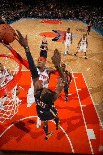 NEW YORK, NY - MARCH 13: Carmelo Anthony #7 of the New York Knicks has his shot blocked by Roy Hibbert #55 of the Indiana Pacers during a game on March 13, 2011 at Madison Square Garden in New York City.  <br /><br /><span class="help">(Photo by Nathaniel S. Butler/NBAE via Getty Images)</span>