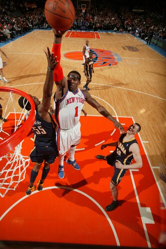 NEW YORK, NY - MARCH 13: Amar'e Stoudemire #1 of the New York Knicks dunks against Roy Hibbert #55 of the Indiana Pacers during a game on March 13, 2011 at Madison Square Garden in New York City.  <br /><br /><span class="help">(Photo by Nathaniel S. Butler/NBAE via Getty Images)</span>