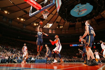 NEW YORK, NY - MARCH 13: Brandon Rush #25 of the Indiana Pacers dunks over Carmelo Anthony #7 of the New York Knicks on March 13, 2011 at Madison Square Garden in New York City.  <br /><br /><span class="help">(Photo by Nathaniel S. Butler/NBAE via Getty Images)</span>