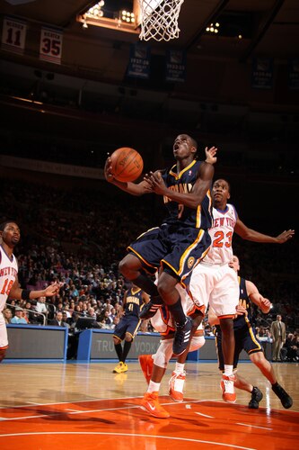 NEW YORK, NY - MARCH 13: Darren Collison #2 of the Indiana Pacers shoots against Toney Douglas #23 of the New York Knicks on March 13, 2011 at Madison Square Garden in New York City.  <br /><br /><span class="help">(Photo by Nathaniel S. Butler/NBAE via Getty Images) *** Local Caption*** Darren Collison;Toney Douglas</span>