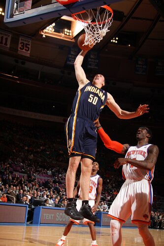 NEW YORK, NY - MARCH 13: Tyler Hansbrough #50 of the Indiana Pacers dunks over Amar'e Stoudemire #1 of the New York Knicks on March 13, 2011 at Madison Square Garden in New York City.  <br /><br /><span class="help">(Photo by Nathaniel S. Butler/NBAE via Getty Images)</span>