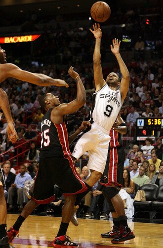 MIAMI - MARCH 14:  Guard Tony Parker #9 of the San Antonio Spurs shoots against the Miami Heat at American Airlines Arena on March 14, 2011 in Miami, Florida. <br /><br /><span class="help">(Photo by Marc Serota/Getty Images)</span>