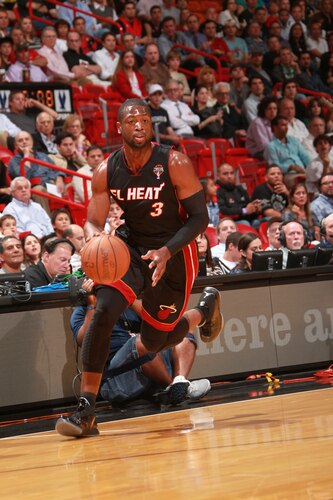 MIAMI - MARCH 14:  Dwyane Wade #3 of the Miami Heat moves the ball against the San Antonio Spurs on March 14, 2011 at American Airlines Arena in Miami, Florida. <br /><br /><span class="help">(Photo by Victor Baldizon/NBAE via Getty Images)</span>