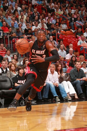 MIAMI - MARCH 14:  Dwyane Wade #3 of the Miami Heat drives to the basket against the San Antonio Spurs on March 14, 2011 at American Airlines Arena in Miami, Florida. <br /><br /><span class="help">(Photo by Victor Baldizon/NBAE via Getty Images)</span>