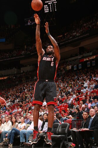MIAMI - MARCH 14:  LeBron James #6 of the Miami Heat shoots against the San Antonio Spurs on March 14, 2011 at American Airlines Arena in Miami, Florida. <br /><br /><span class="help">(Photo by Victor Baldizon/NBAE via Getty Images)</span>