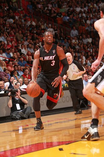 MIAMI - MARCH 14:  Dwyane Wade #3 of the Miami Heat moves the ball against the San Antonio Spurs on March 14, 2011 at American Airlines Arena in Miami, Florida. <br /><br /><span class="help">(Photo by Victor Baldizon/NBAE via Getty Images)</span>