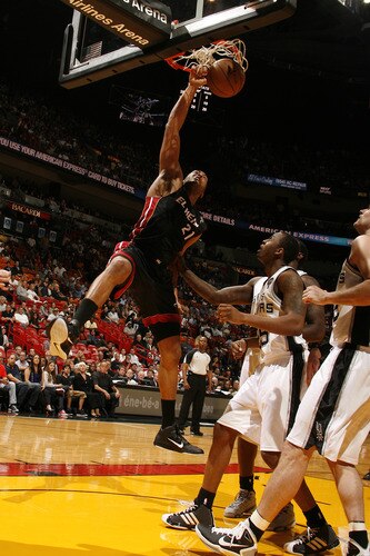 MIAMI - MARCH 14: Jamaal Magloire #21 of the Miami Heat dunks over the San Antonio Spurs on March 14, 2011 at American Airlines Arena in Miami, Florida. <br /><br /><span class="help">(Photo by Issac Baldizon/NBAE via Getty Images)</span>