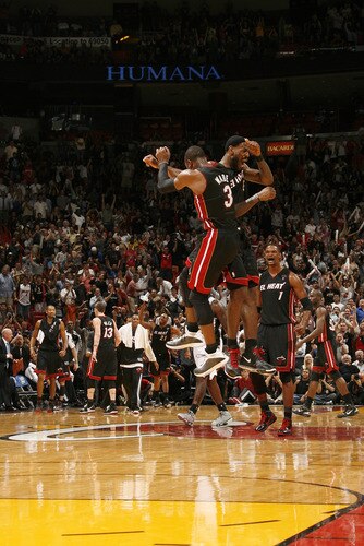 MIAMI - MARCH 14: Dwyane Wade #3 and LeBron James #6 of the Miami Heat celebrate a win against the San Antonio Spurs on March 14, 2011 at American Airlines Arena in Miami, Florida. <br /><br /><span class="help">(Photo by Issac Baldizon/NBAE via Getty Images)</span>