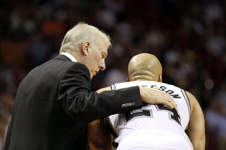 MIAMI - MARCH 14:  San Antonio Spurs Coach Greg Popovich chats with Richard Jefferson #24 against the Miami Heat at American Airlines Arena on March 14, 2011 in Miami, Florida.The Heat defeated the Spurs 110-80. <br /><br /><span class="help">(Photo by Marc Serota/Getty Images)</span>