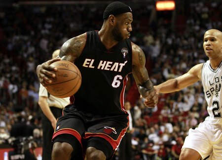 MIAMI - MARCH 14:  Forward LeBron James #6 of the Miami Heat drives against forward Richard Jefferson #24 of the San Antonio Spurs at American Airlines Arena on March 14, 2011 in Miami, Florida. The Heat defeated the Spurs 110-80. <br /><br /><span class="help">(Photo by Marc Serota/Getty Images)</span>