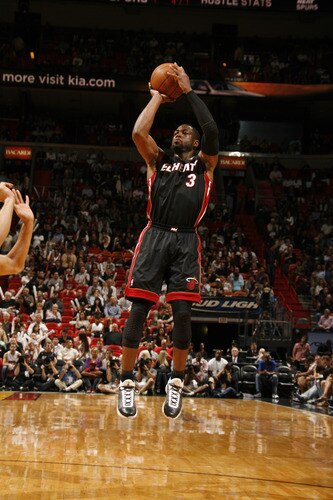 MIAMI - MARCH 14: Dwyane Wade #3 of the Miami Heat shoots against the San Antonio Spurs on March 14, 2011 at American Airlines Arena in Miami, Florida. <br /><br /><span class="help">(Photo by Issac Baldizon/NBAE via Getty Images)</span>