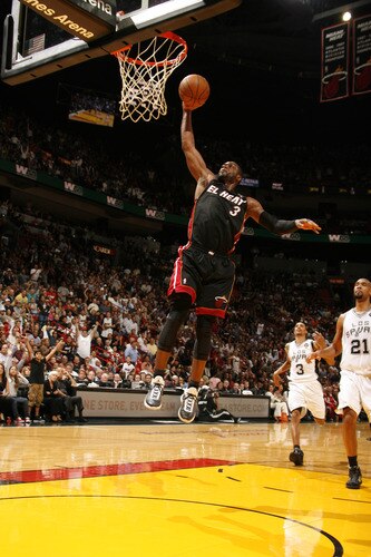 MIAMI - MARCH 14: Dwyane Wade #3 of the Miami Heat dunks against the San Antonio Spurs on March 14, 2011 at American Airlines Arena in Miami, Florida. <br /><br /><span class="help">(Photo by Issac Baldizon/NBAE via Getty Images)</span>