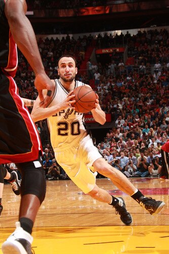 MIAMI - MARCH 14:  Manu Ginobili #20 of the San Antonio Spurs in action against the Miami Heat on March 14, 2011 at American Airlines Arena in Miami, Florida. <br /><br /><span class="help">(Photo by Victor Baldizon/NBAE via Getty Images)</span>