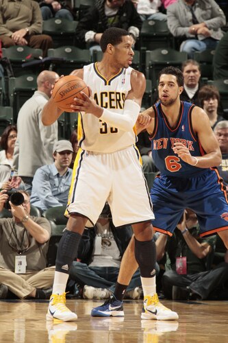 INDIANAPOLIS, IN - MARCH 15:  Danny Granger #33 of the Indiana Pacers looks to pass against Landry Fields #6 of the New York Knicks on March 15, 2011 at Conseco Fieldhouse in Indianapolis, Indiana.  <br /><br /><span class="help">(Photo by Ron Hoskins/NBAE via Getty Images)</span>