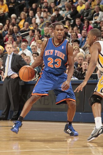 INDIANAPOLIS, IN - MARCH 15:  Toney Douglas #23 of the New York Knicks looks to drive against A.J. Price #12 of the Indiana Pacers on March 15, 2011 at Conseco Fieldhouse in Indianapolis, Indiana.  <br /><br /><span class="help">(Photo by Ron Hoskins/NBAE via Getty Images)</span>