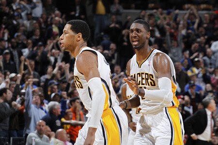 INDIANAPOLIS, IN - MARCH 15: Danny Granger #33 of the Indiana Pacers celebrates with Roy Hibbert #55 after hitting the game-winning shot against the New York Knicks on March 15, 2011 at Conseco Fieldhouse in Indianapolis, Indiana. The Pacers defeated the Knicks 119-117. <br /><br /><span class="help">(Photo by Joe Robbins/NBAE via Getty Images)</span>