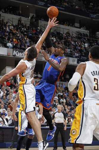 INDIANAPOLIS, IN - MARCH 15: Amar'e Stoudemire #1 of the New York Knicks shoots over Jeff Foster #10 of the Indiana Pacers on March 15, 2011 at Conseco Fieldhouse in Indianapolis, Indiana. The Pacers defeated the Knicks 119-117. <br /><br /><span class="help">(Photo by Joe Robbins/NBAE via Getty Images)</span>