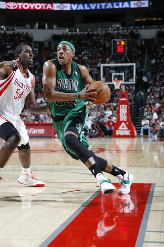 HOUSTON, TX - MARCH 18:  Paul Pierce #34 of the Boston Celtics drives the ball past Patrick Patterson #54 of the Houston Rockets on March 18, 2011 at the Toyota Center in Houston, Texas. </div>
 <br />

<div align="center">(Photo by Bill Baptist/NBAE via Getty Images)