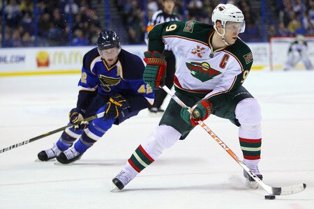 ST. LOUIS, MO - MARCH 29: Mikko Koivu #9 of the Minnesota Wild moves the puck up ice against the St. Louis Blues at the Scottrade Center on March 29, 2011 in St. Louis, Missouri.  <br /><br /><span class="help">(Photo by Dilip Vishwanat/Getty Images)</span>