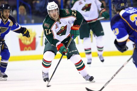 ST. LOUIS, MO - MARCH 29: Cal Clutterbuck #22 of the Minnesota Wild looks to pass the puck against the St. Louis Blues at the Scottrade Center on March 29, 2011 in St. Louis, Missouri.  <br /><br /><span class="help">(Photo by Dilip Vishwanat/Getty Images)</span>