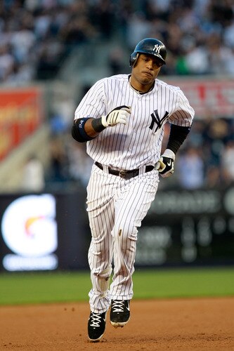 NEW YORK, NY - APRIL 26:  Robinson Cano #24 of the New York Yankees runs the bases after hitting a homer against the Chicago White Sox at Yankee Stadium on April 26, 2011 in the Bronx borough of New York City.  <br /><br /><span class="help">(Photo by Chris Trotman/Getty Images)</span>