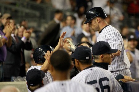 NEW YORK, NY - APRIL 26:  Brett Gardner #11 of the New York Yankees celebrates his homerun in the fifth inning with his teammates against the Chicago White Sox at Yankee Stadium on April 26, 2011 in the Bronx borough of New York City.  <br /><br /><span class="help">(Photo by Chris Trotman/Getty Images)</span>