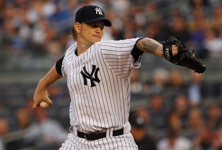 NEW YORK - MAY 21:  A.J. Burnett #34 of the New York Yankees delivers a pitch in the first inning against the New York Mets on May 21, 2011 at Yankee Stadium in the Bronx borough of New York City.  <br /><br /><span class="help">(Photo by Mike Stobe/Getty Images)</span>