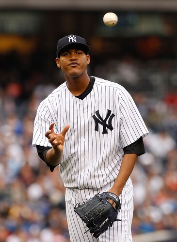 NEW YORK - MAY 22:  Ivan Nova #47 of the New York Yankees reacts after giving up a run against the New York Mets on May 22, 2011 at Yankee Stadium in the Bronx borough of New York City.  <br /><br /><span class="help">(Photo by Mike Stobe/Getty Images)</span>