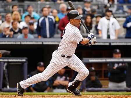 NEW YORK - MAY 22:  Derek Jeter #2 of the New York Yankees hits a two run single in the seventh inning to tie the game at three against the New York Mets on May 22, 2011 at Yankee Stadium in the Bronx borough of New York City. Yankees defeat the Mets 9-3. <br /><br /><span class="help">(Photo by Mike Stobe/Getty Images)</span>