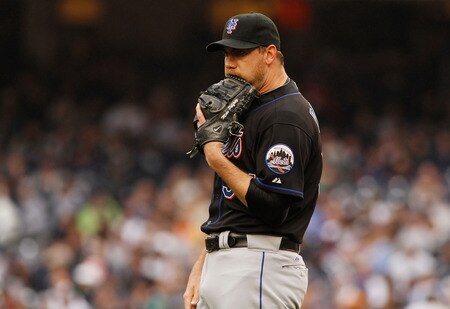NEW YORK - MAY 22:  Mike Pelfrey #34 of the New York Mets reacts after giving up a first inning home run to Curtis Granderson #14 of the New York Yankees (not pictured) on May 22, 2011 at Yankee Stadium in the Bronx borough of New York City. Yankees defeat the Mets 9-3. <br /><br /><span class="help">(Photo by Mike Stobe/Getty Images)</span>