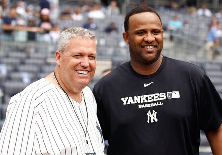 NEW YORK - JUNE 12:  New York Jets head coach Rex Ryan poses for a photo with CC Sabathia #52 of the New York Yankees on June 12, 2011 at Yankee Stadium in the Bronx borough of New York City.  <br /><br /><span class="help">(Photo by Mike Stobe/Getty Images)</span>