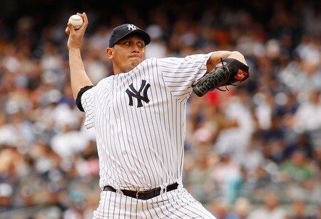 NEW YORK - JUNE 12:  Freddy Garcia #36 of the New York Yankees delivers a pitch in the first inning against the Cleveland Indians on June 12, 2011 at Yankee Stadium in the Bronx borough of New York City.  <br /><br /><span class="help">(Photo by Mike Stobe/Getty Images)</span>