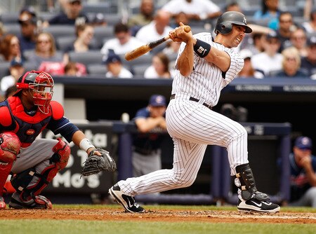NEW YORK - JUNE 12:  Jorge Posada #20 of the New York Yankees singles in the second inning against the Cleveland Indians on June 12, 2011 at Yankee Stadium in the Bronx borough of New York City.  <br /><br /><span class="help">(Photo by Mike Stobe/Getty Images)</span>