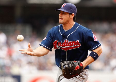 NEW YORK - JUNE 12:  Matt LaPorta #7 of the Cleveland Indians flips the ball to first base for a out against the New York Yankees on June 12, 2011 at Yankee Stadium in the Bronx borough of New York City.  <br /><br /><span class="help">(Photo by Mike Stobe/Getty Images)</span>
