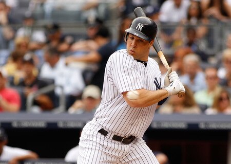 NEW YORK - JUNE 12:  Mark Teixeira #25 of the New York Yankees gets out of the way of the pitch during their game against the Cleveland Indians on June 12, 2011 at Yankee Stadium in the Bronx borough of New York City.  <br /><br /><span class="help">(Photo by Mike Stobe/Getty Images)</span>