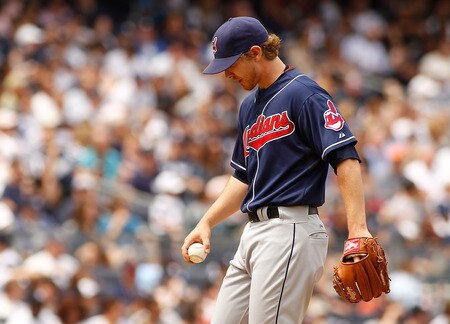 NEW YORK - JUNE 12:  Josh Tomlin #43 of the Cleveland Indians reacts after giving up five runs in the bottom of the fifth inning against the New York Yankees on June 12, 2011 at Yankee Stadium in the Bronx borough of New York City.  <br /><br /><span class="help">(Photo by Mike Stobe/Getty Images)</span>