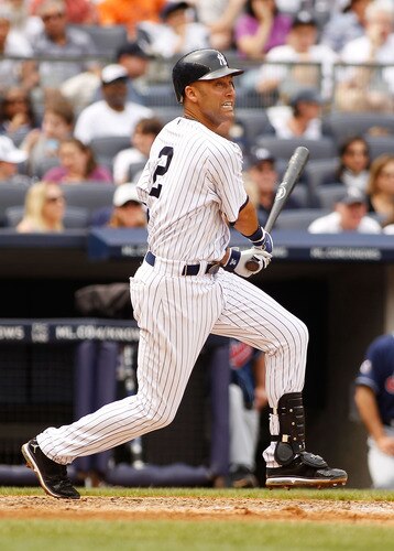 NEW YORK - JUNE 12:  Derek Jeter #2 of the New York Yankees hits an RBI single in the fifth inning against the Cleveland Indians on June 12, 2011 at Yankee Stadium in the Bronx borough of New York City.  <br /><br /><span class="help">(Photo by Mike Stobe/Getty Images)</span>